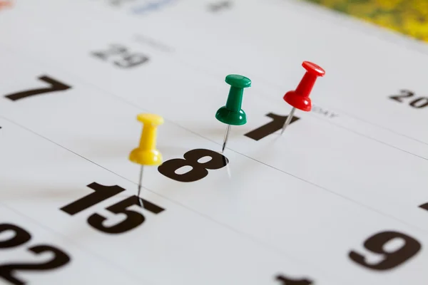 Pushpins on calendar, Busy and overworking days. Important date — Stock Photo, Image