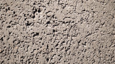 Açık gri kil tuğla ve havan topu duvarı. Duvar kağıdı arka planı. Metin ve başlık için yer