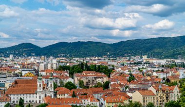 Graz, Austria - June 16, 2020 - a view of the old town of Graz Styria from Castle Hill (Schlossberg) with medieval houses, churches, and buildings