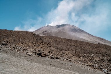 Etna Volcano fuming on the Italian island of Sicily clipart