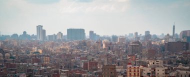 Cairo, Egypt - March 26, 2021 - moody aerial panoramic view of downtown Cairo in daylight with Cairo Tower in the background