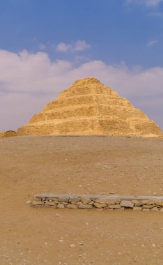Vertical view of the Pyramid of Djoser in Saqqara, the oldest pyramid in all of Egypt clipart