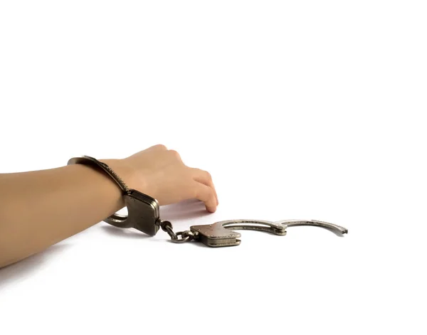 Woman's hand in handcuffs — Stock Photo, Image