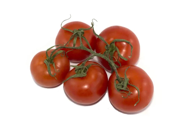 Отделение от пяти красных помидоров на белом фоне — стоковое фото