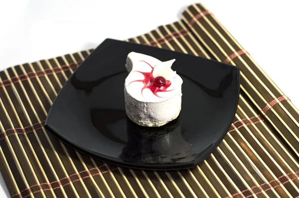 white cake in the form of a drop