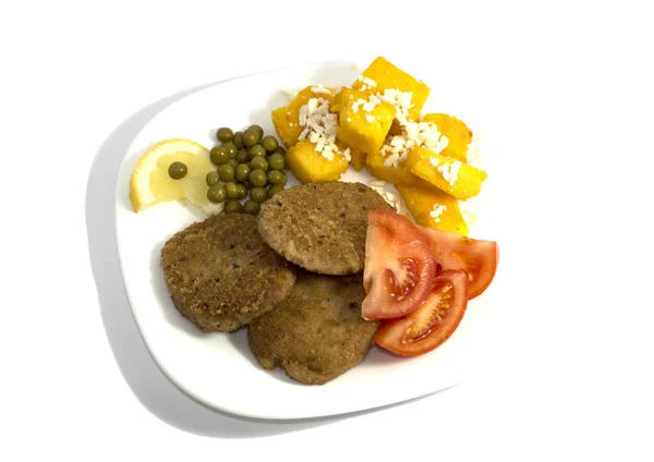 Comida vegetariana con salsa y pan, en una placa blanca, la vista superior — Foto de Stock