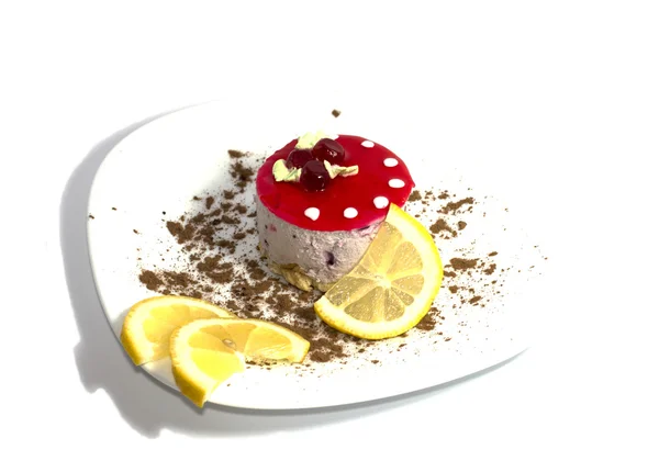 Tårta i en bild av en svamp, med citron segment, ovanifrån — Stockfoto