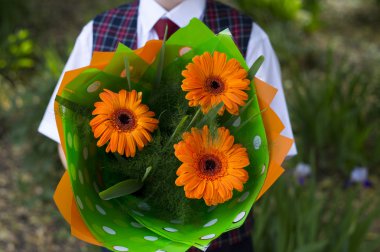 the school student with flowers, a close up clipart
