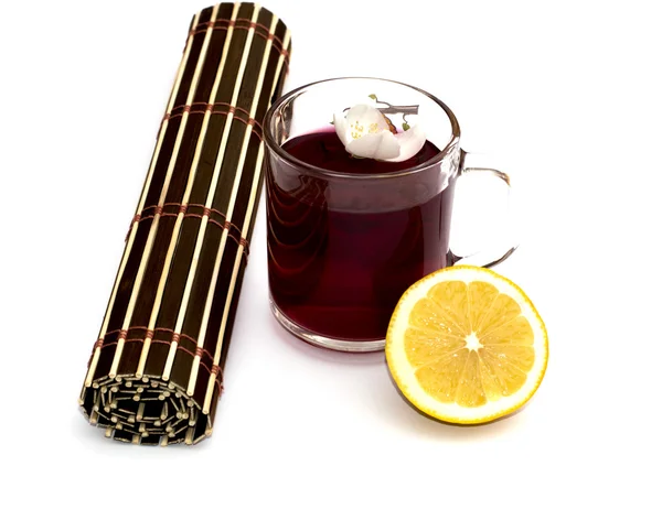 Glass with grass drinks of red color — Stock Photo, Image