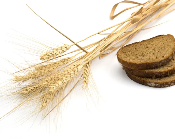 The cut bread and ears of wheat
