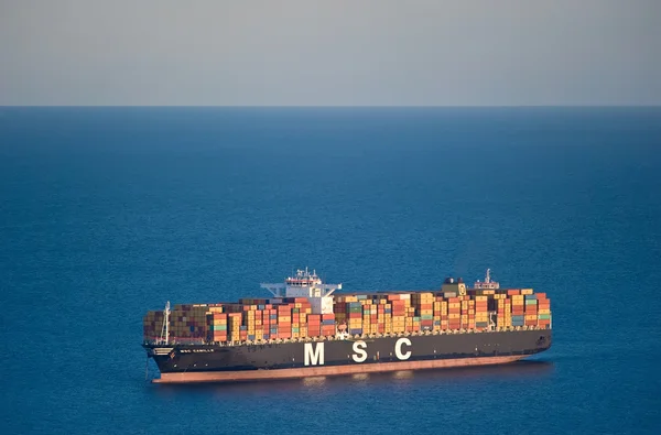 Containerschip Msc Camille permanent op de wegen anker. Nachodka Bay. East (Japan) Zee. 17.09.2014 — Stockfoto