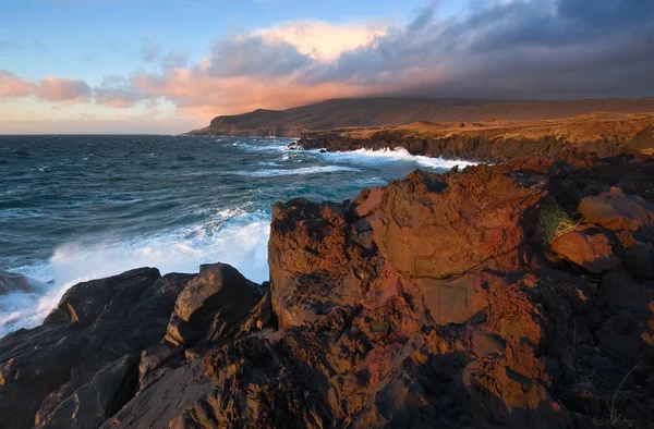 Lava field on the coast of the island of Iturup. Yankito plateau. Royalty Free Stock Photos