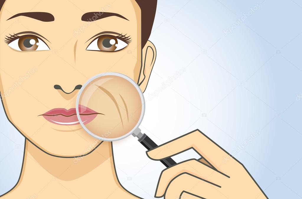 Woman magnifying wrinkle on cheek