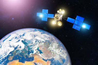 Uzay iletişim uydusu Dünya 'nın yörüngesinde. Bu görüntünün elementleri NASA tarafından desteklenmektedir.