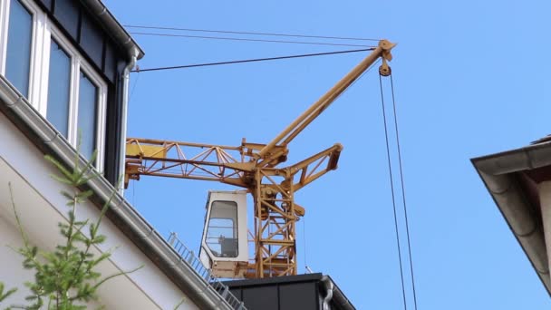 Crane transporting container with ground — Stock Video