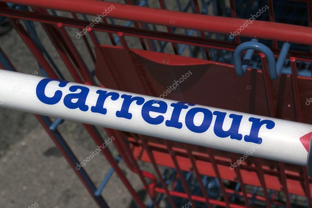 Paris, France-June 20, 2016: letters Carrefour on a shopping cart in Paris