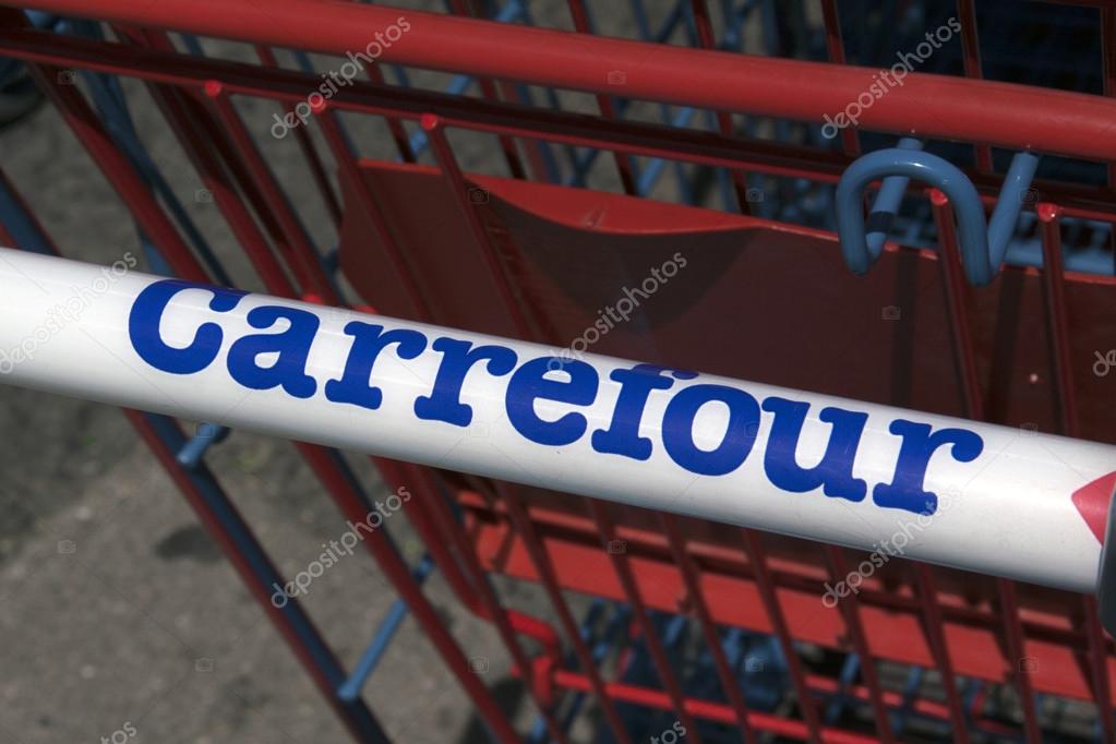 Paris, France-June 20, 2016: letters Carrefour on a shopping cart in Paris
