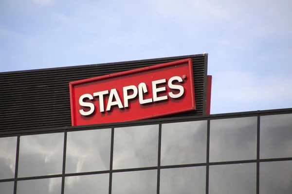 Staples letters on a wall — Stock Photo, Image