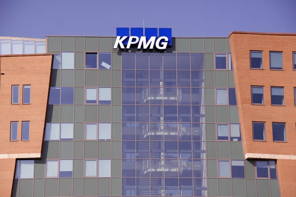 Kpmg letters on the head office in Amsterdam — Stock Photo, Image