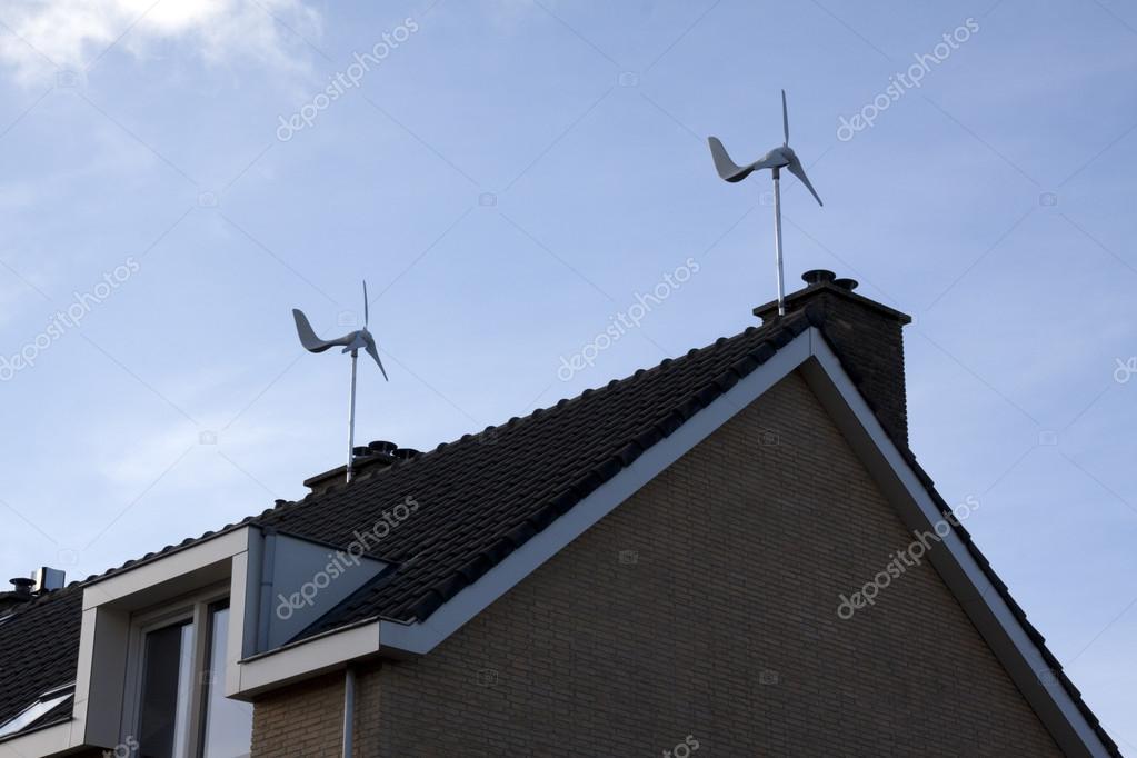 Small Wind Turbine on top of a roof in Rijswijk Holland Stock Photo by