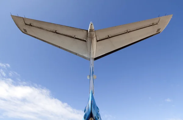 Tail of an airplane and blue air — Stock Photo, Image