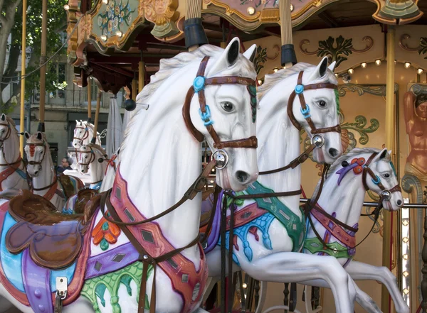 Wooden horses in an caroussel — Stock Photo, Image