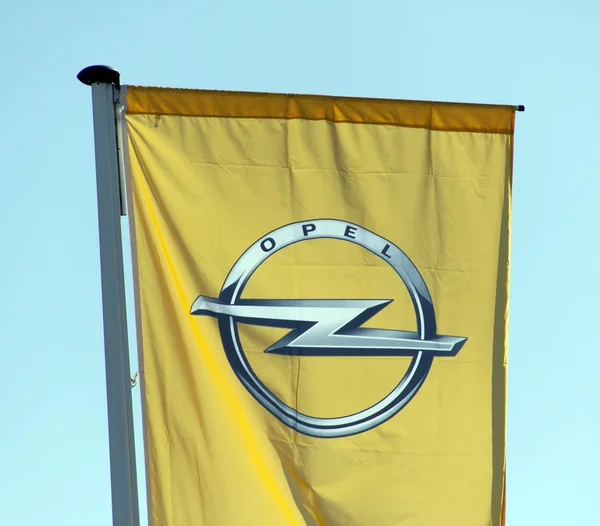 Opel flag in front of a opel Garage — Stock Photo, Image