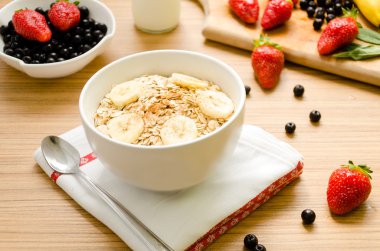 Healthy breakfast with bowl of cereals (muesli), strawberry, wil clipart