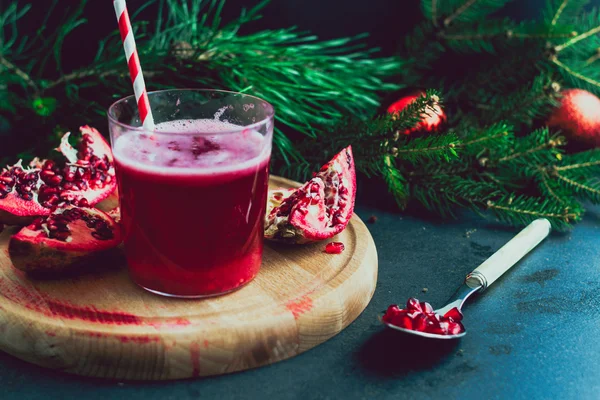 christmas desk with juice pomegranate