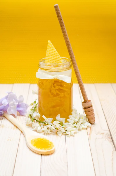 Locust Honey Retro Jar with locust blossoms Stock Image