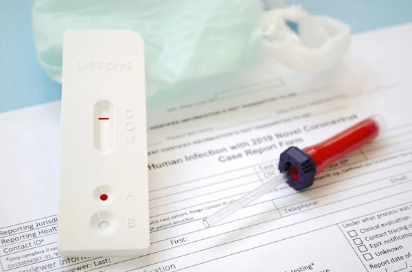 Lab performing rapid diagnostic test for antibodies to detect presence of antigens COVID-19 disease.