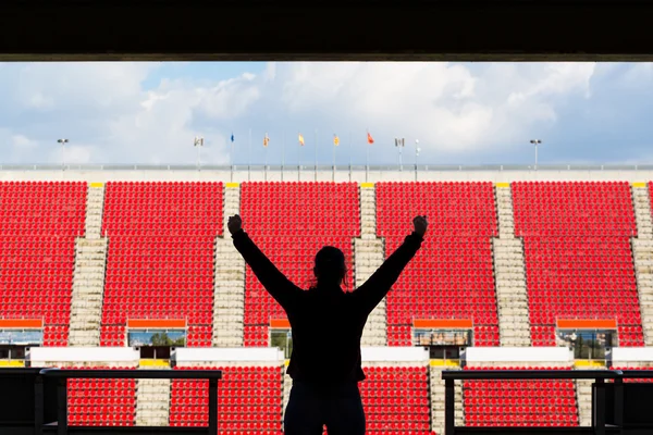 Silhouette of female football fan — Stock Photo, Image