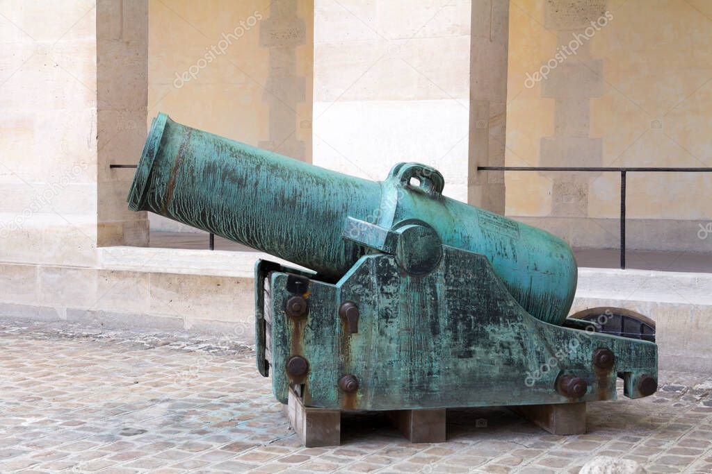 Historic artillery gun of Les Invalides in Paris. Les Invalides (National Residence of Invalids) is a complex of museums and monuments relating to military history of France.