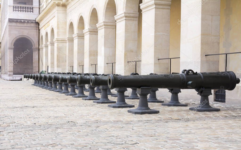 Historic Napoleonic artillery gun of Les Invalides in Paris. Les Invalides (National Residence of Invalids) is a complex of museums and monuments relating to military history of France.
