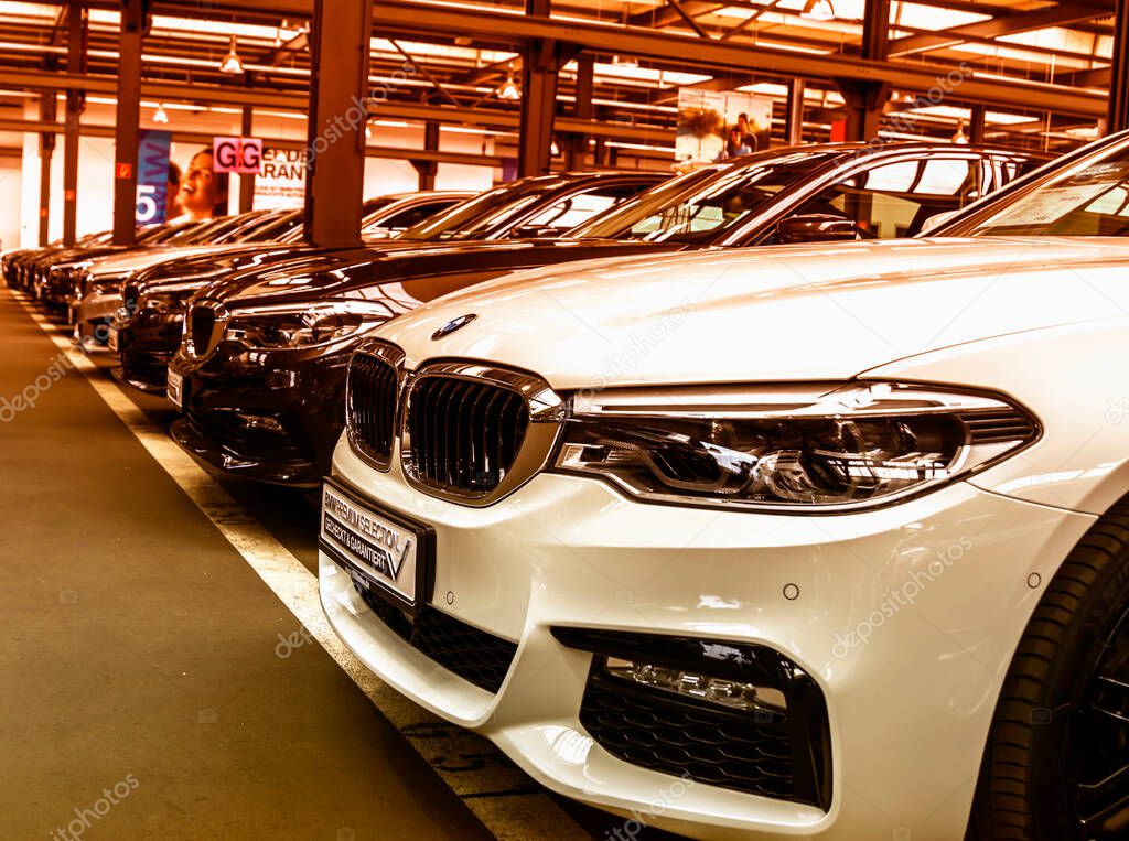 Nurnberg, Germany - BMW cars parked in front of car dealer. view of parked luxury cars in row.