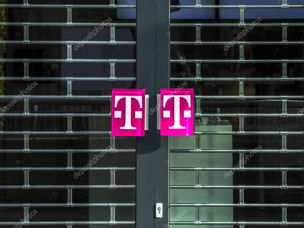 ROTTERDAM, NETHERLANDS: T-Mobile logo on a door handle. T-Mobile is the brand name used by the mobile communications subsidiaries of the German telecommunications company Deutsche Telekom
