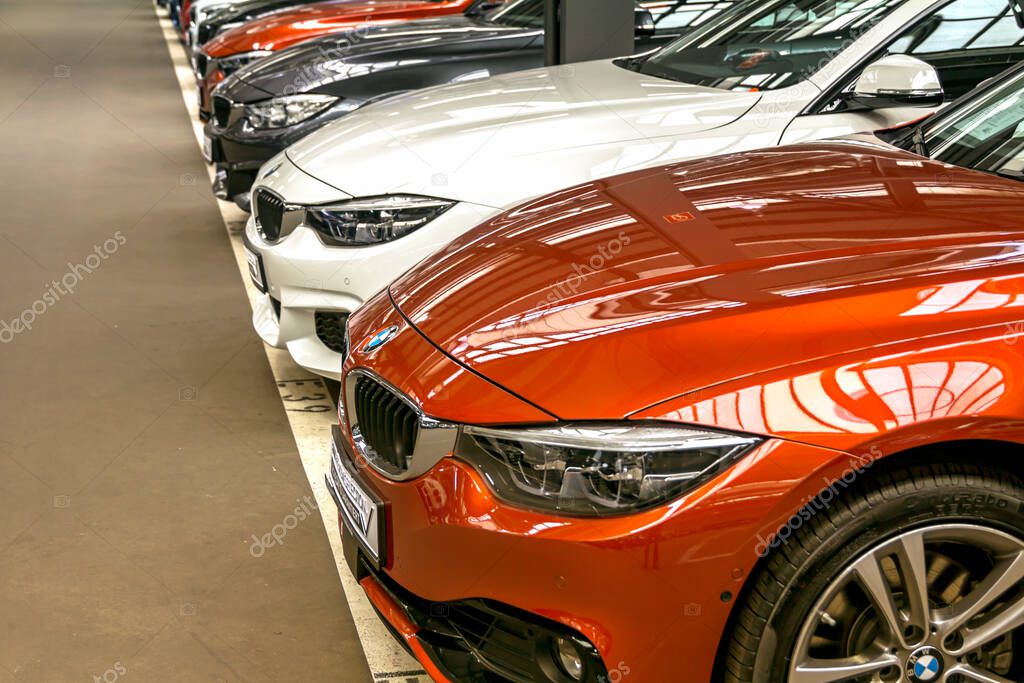 Nurnberg, Germany, Apr 4,2019 - BMW cars parked in front of car dealer. view of parked luxury cars in row.