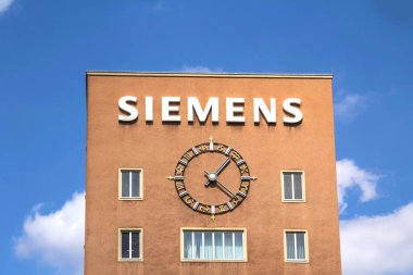 Erlangen, Germany- SEP 15, 2018: Siemens sign; Siemens AG is a German company founded in 1847 clipart