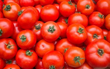 Makro fotograflı sebzeli domates vişneli. Doku arka plan kiraz domatesleri. Stok fotoğrafı. Kiraz domatesleri küçük sulu ve kırmızı..