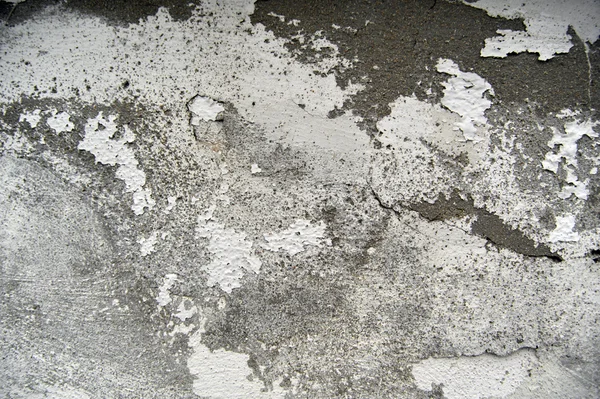 Parede de concreto rachado como um fundo grunge — Fotografia de Stock