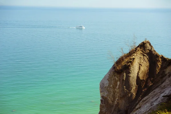 Ship is sailing on Baltic sea behind rock — Stock Photo, Image