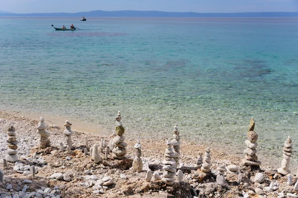 Stones pyramid from pebbles on Adriatic sea in Croatia — Stock Photo, Image