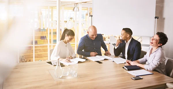 Business professionals laughing during meeting — Stock Photo, Image