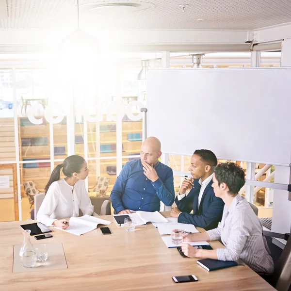 Upper management during early morning meeting — Stock Photo, Image