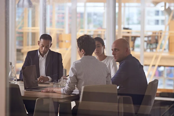 Business executives sitting in meeting — Stock Photo, Image