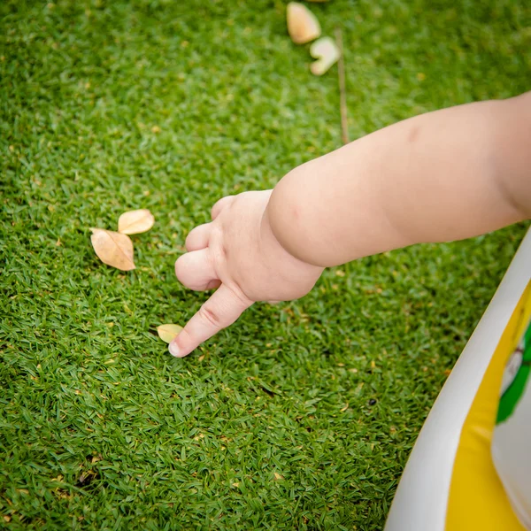 Baby boy in action at the park — Stock Photo, Image