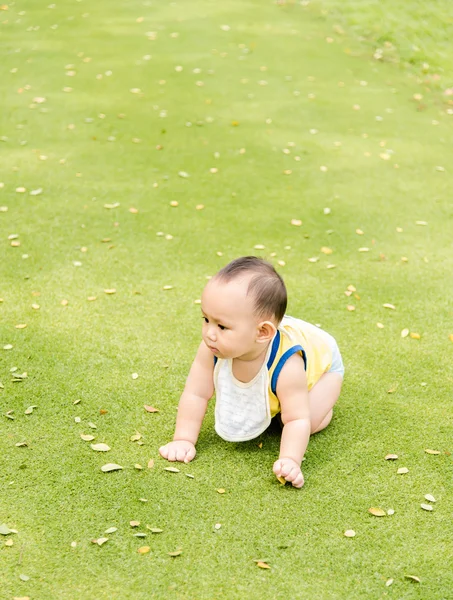 Baby boy in action at the park — Stock Photo, Image