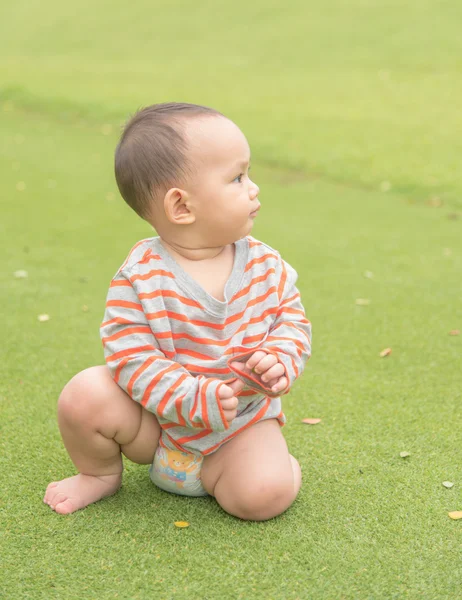 Baby boy in action at the park — Stock Photo, Image