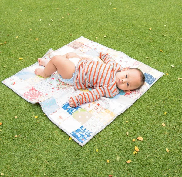 Asian baby laying — Stock Photo, Image