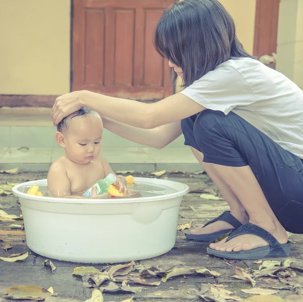 Baby bathing outdoor — Stock Photo, Image